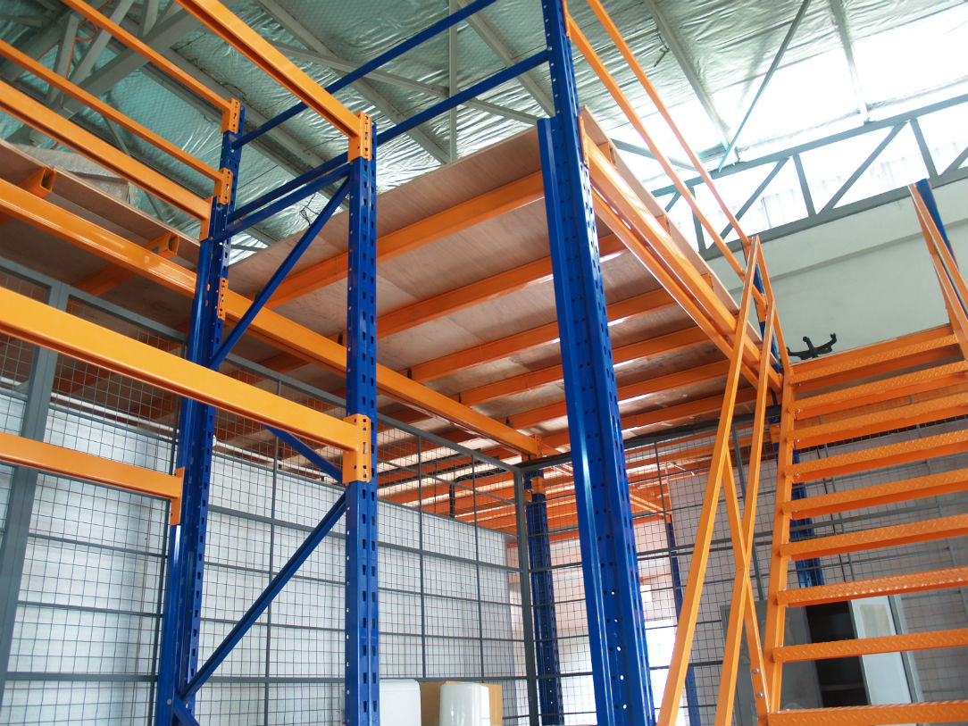 Image of staircase, floor beams, and floor joists arrangement under Nutech Rack Supported Platform. 